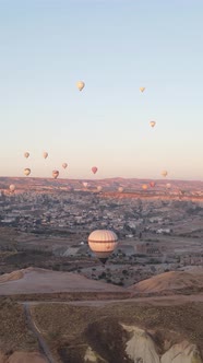 Vertical Video of Hot Air Balloons Flying in the Sky Over Cappadocia Turkey