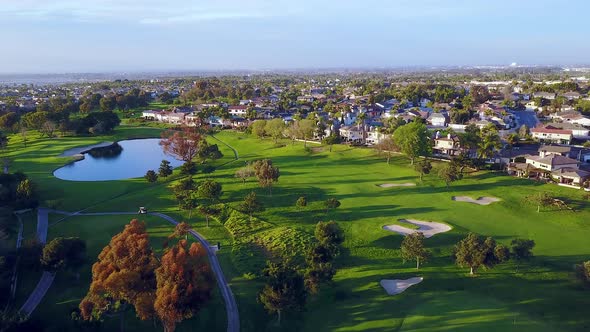 Drone footage flying over a Golf course in Huntington Beach, Ca. Footage also captures a Golf cart d