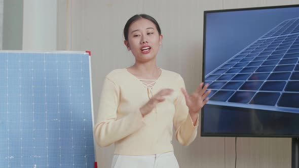 Asian Woman Engineer Succeed Presenting About The Work Of Solar Cell Before Clapping Her Hands