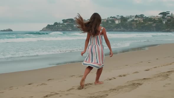 Joyful Girl Having Fun at Sea Beach