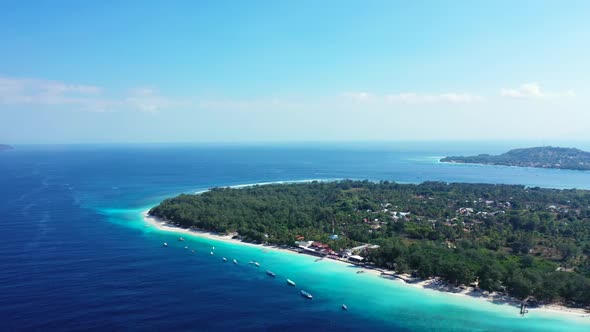 Aerial above landscape of luxury resort beach journey by blue green lagoon and clean sandy backgroun