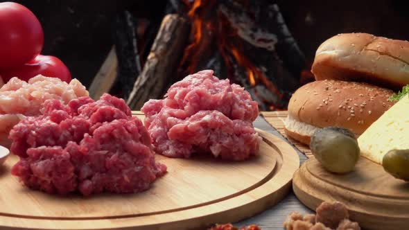 Closeup of Rhe Raw Ingredients for Homemade Burger Preparation Minced Meat