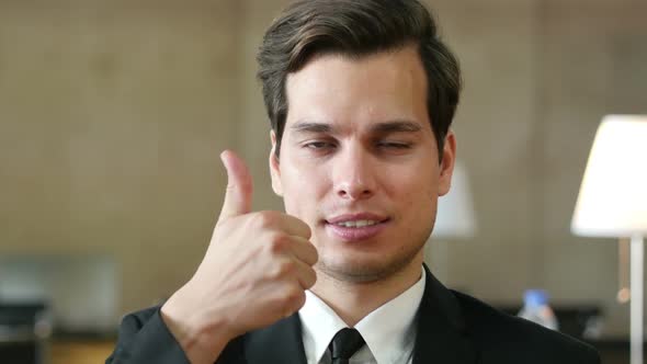 Thumbs Up by Businessman, Portrait in Office