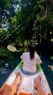 Couple in Kayak in the Jungle of Krabi Thailand Men and Woman in Kayak at a Tropical Jungle in Krabi