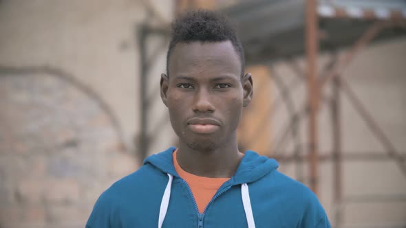 Confident Attractive Young American African Man Looking at Camera-Outdoor