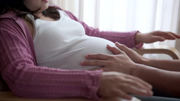 Pregnant Couple Feels Love and Relax at Home