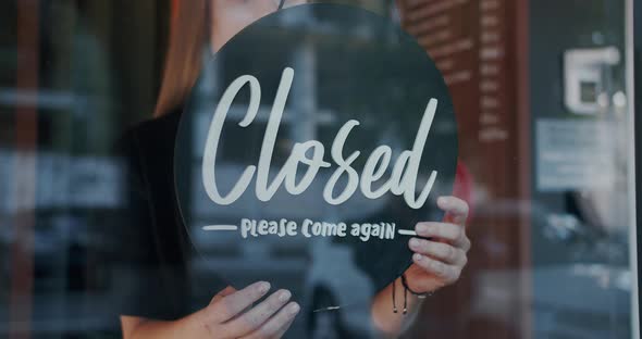 Coffee Seller Turning Open Sign Board Opening Cafeteria for Customers