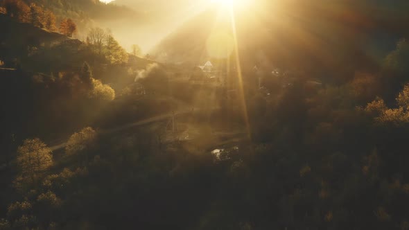 Sun Over Mountain Ridges Aerial