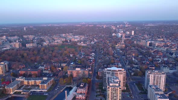 aerial going up looking over a city during fall.