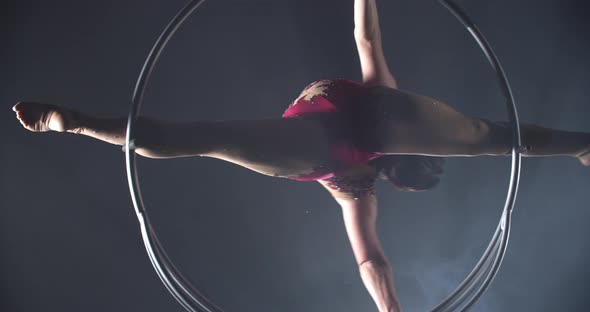 Beautiful Gymnastics Show By a Young Woman in Red Costume Split