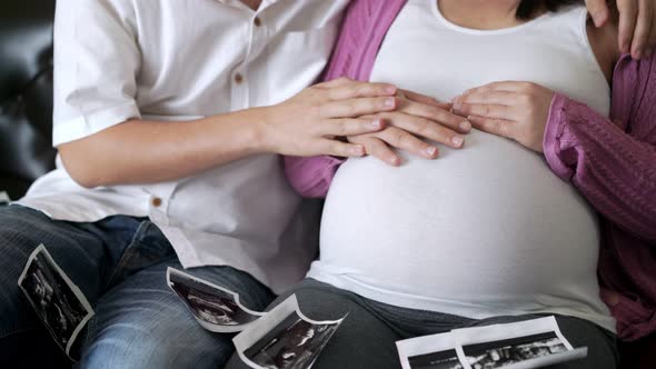 Pregnant Couple Feels Love and Relax at Home