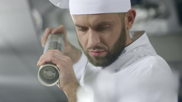 Portrait of Chef Cooking at Kitchen