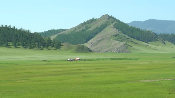Mongolian Ger Tent in Large Valley Plain of Mongolia Geography