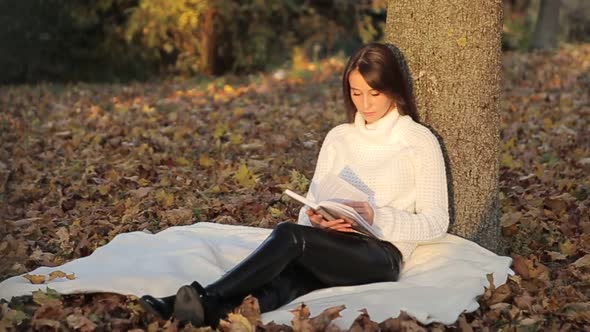 Girl Reading a Book in Park Woman Green