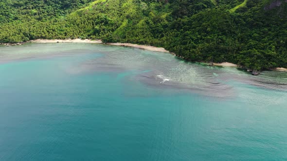 Coastline with White Beach and Rainforest, Aerial View. Luzon Island, Philippines.