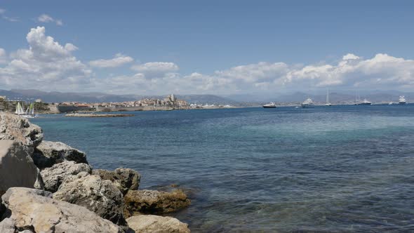 ANTIBES, FRANCE - JULY 2017  Daily scene from French riviera city with beautiful  blue sea and Alps 