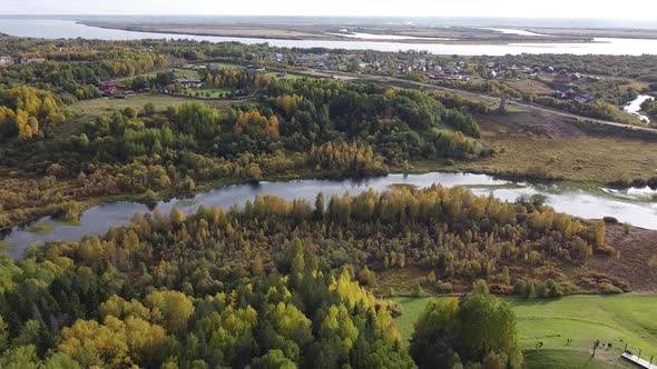 Village on a Hill in the Forest Drone Shooting