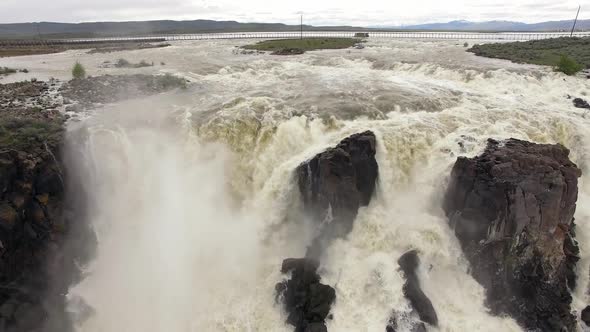 Aerial view of huge overflow waterfall at Magic Reservoir