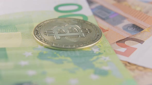 Golden Bitcoin Lies on Euro Banknotes