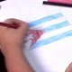 Child's hands drawing flag of Cuba - VideoHive Item for Sale