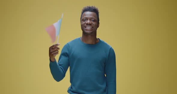 Young Man Waving Italian Flag