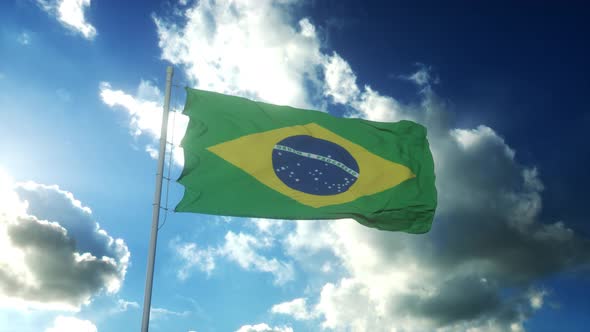 Flag of Brazil Waving at Wind Against Beautiful Blue Sky