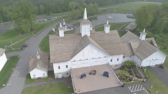 Aerial View of Old Restored Barns on a Spring Day