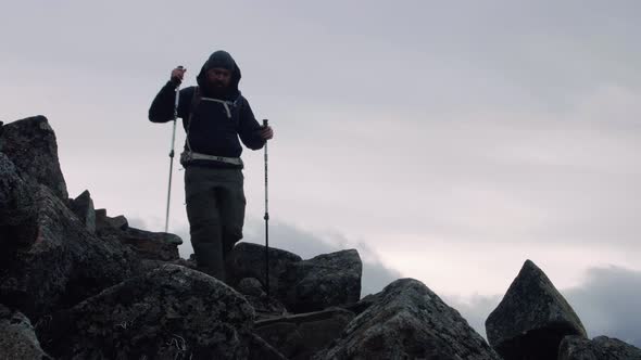 Rugged Terrain Hiking Background Of Man Walking On Boulder Rocks