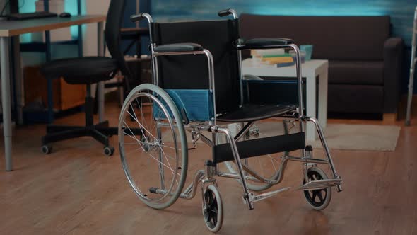 Wheelchair in Empty Space Used By Someone with Physical Disability