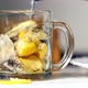 Tea and Many Lemons Being Poured Into Tea Cup - VideoHive Item for Sale