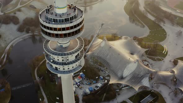 Aerial shot over Olympiaturm tower in Munich Germany