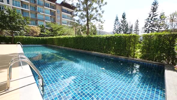 Peaceful and Sunny Swimming Pool Area