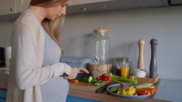 Pregnant woman preparing healthy breakfast. Shot with RED helium camera in 8K