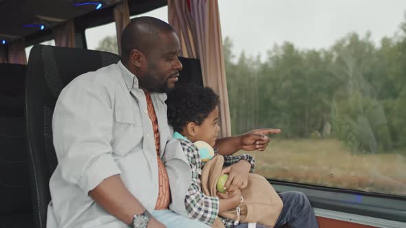 Father and Son on Bus Ride