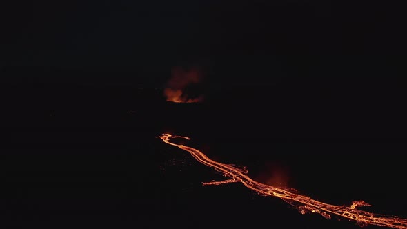 Drone Over Moving River Of Molten Lava From Erupting Volcano