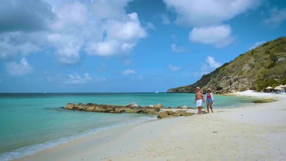 Couple Men and Woman Mid Age on the Beach of Curacao Grote Knip Beach Curacao Dutch Antilles