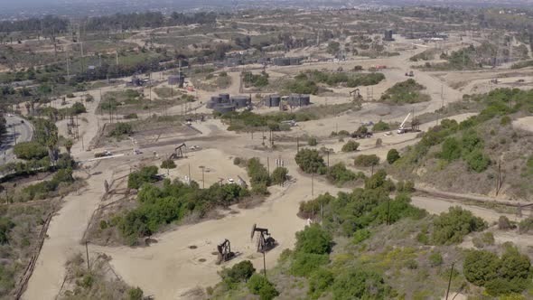 Oil pump jack on the factory. Aerial view oil refinery factory.