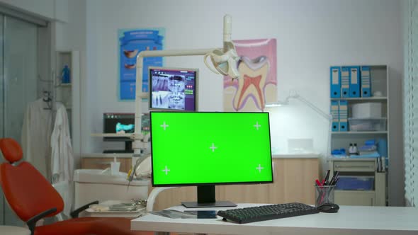 Computer with Green Screen in Stomatological Clinic