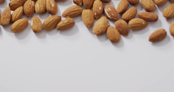 Video of almonds on white background
