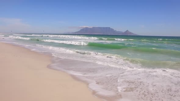 Aerial travel drone view of Table Mountain, Table Bay from Bloubergstrand, Cape Town, South Africa.