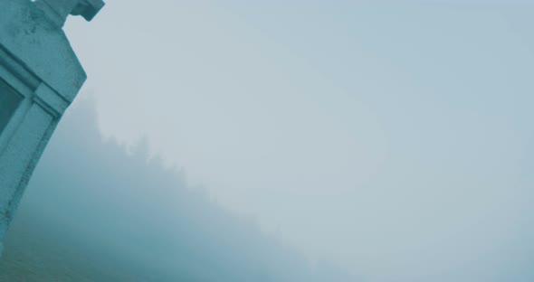 Foggy Medieval Cross Monument