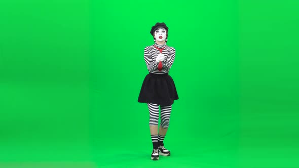 Mime Girl Is Fishing and Gesticulating. Chroma Key. Full Length.