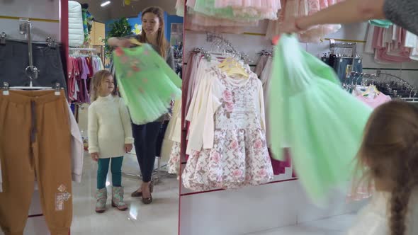 Family Try on Wear Clothing in the Shop.