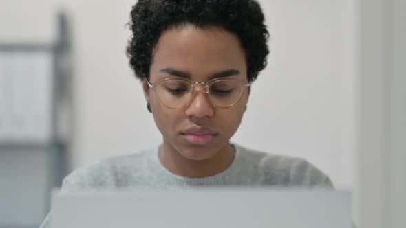 African Woman Using Laptop