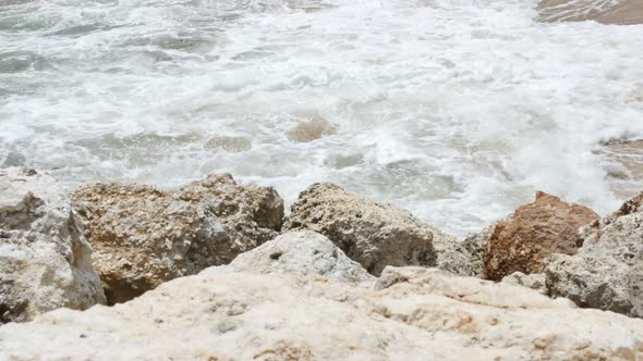 Rocks on the Foreground and Indian Ocean Waves Near Pandawa Beach Bali