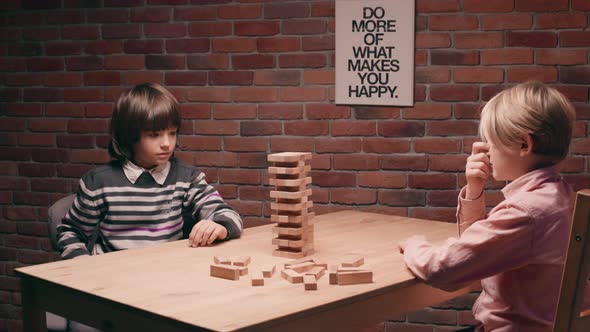 Two Boys Playing Jenga