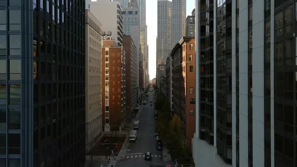 Aerial view big city Chicago downtown between buildings cinematic