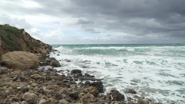 Panoramic View of Golden Beach Bay in Malta on Cloudy Day in Winter