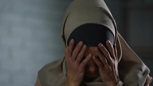 Desperate Muslim Woman Crying, Covering Face With Hands, Family Problem, Shame