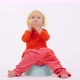Adorable Cheerful Toddler Girl Sitting on Potty Talking on Her Smartphone - VideoHive Item for Sale